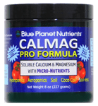 A jar of calmag pro formula with tomatoes.